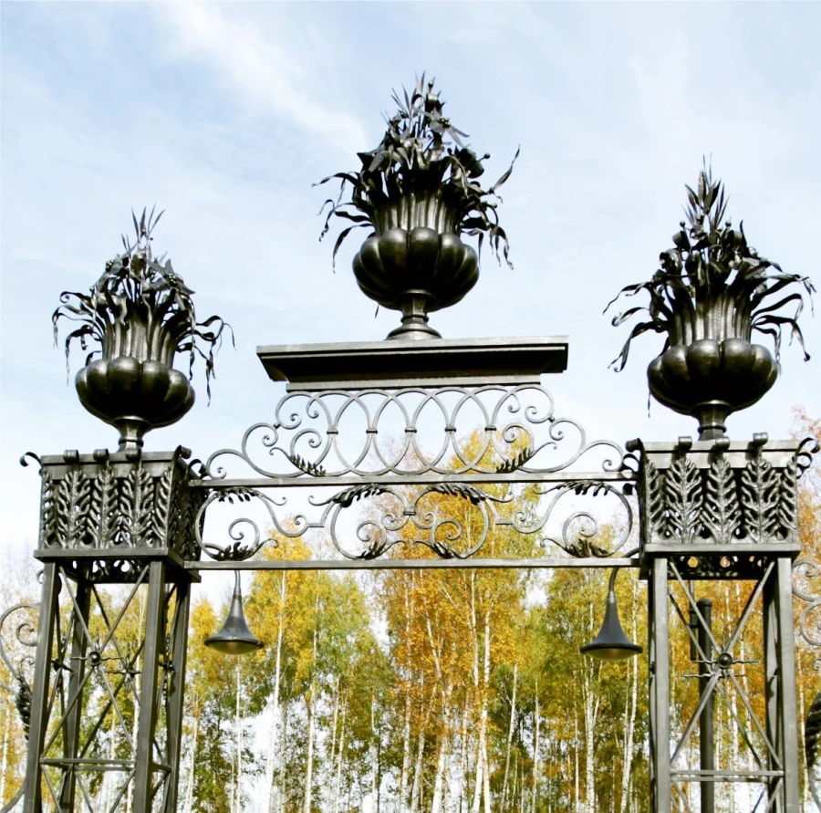 Private residence. Pergola with decorative vases.