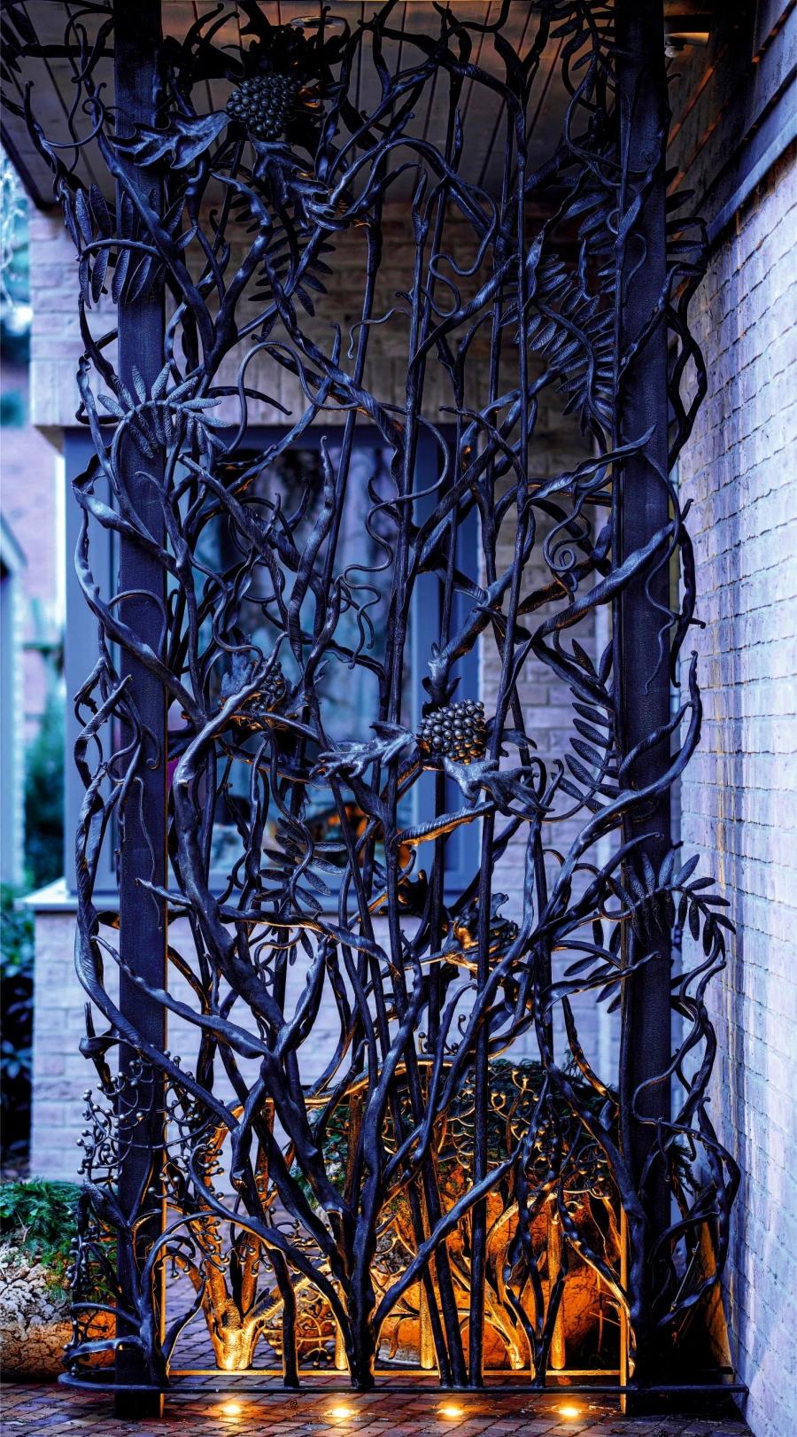 Private residence. Gates, decorative wall.
