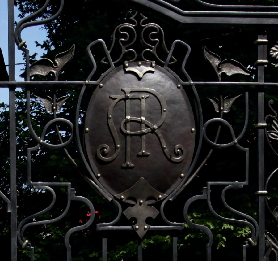 Private residence. Gates, fences, column decorations.