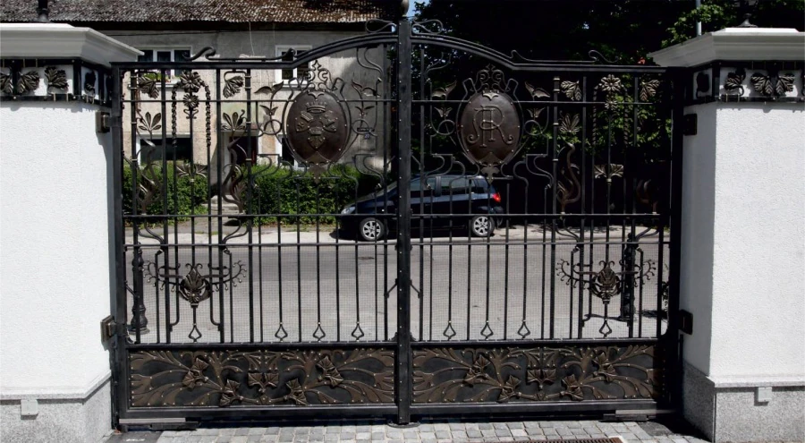 Private residence. Gates, fences, column decorations.