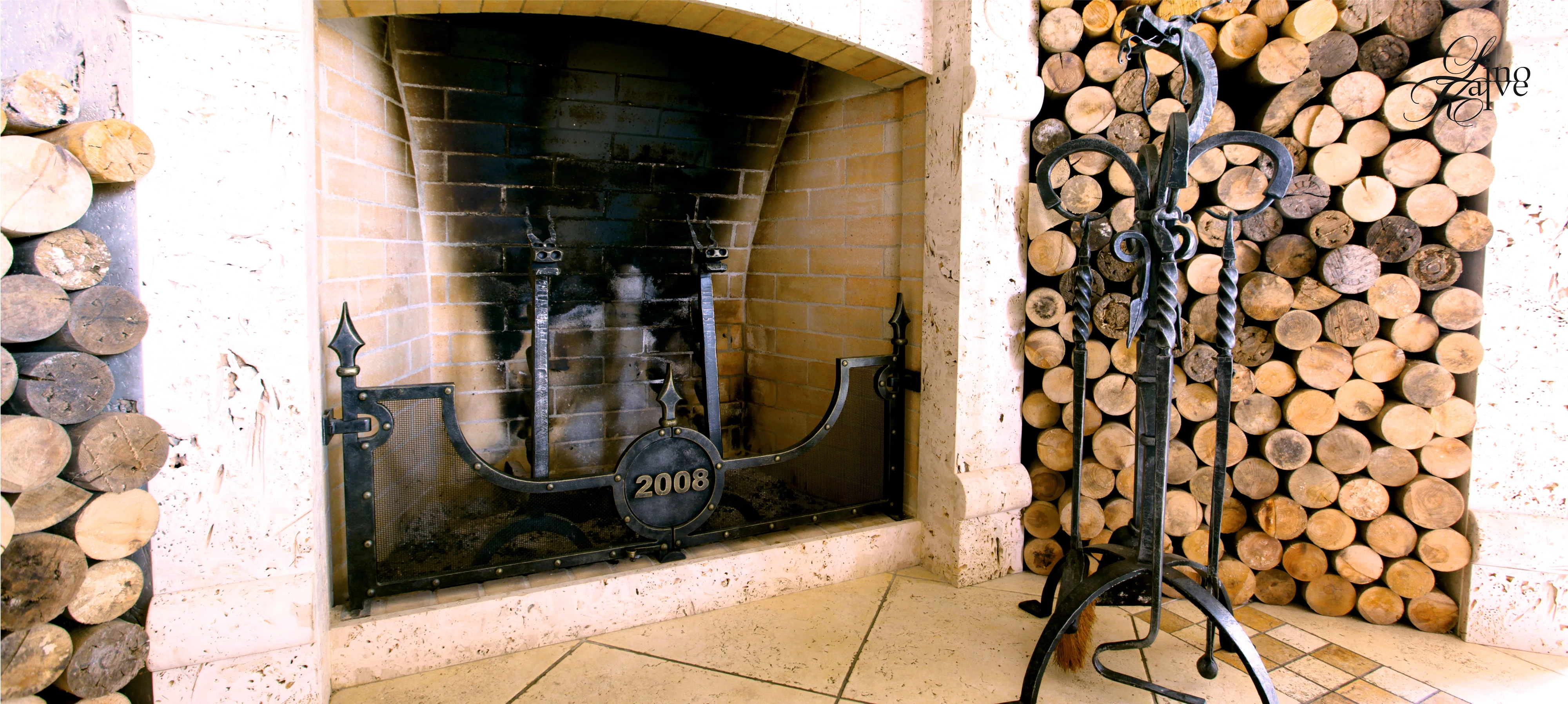 Private residence. Fireplace grilles, doors, fireplace tools.