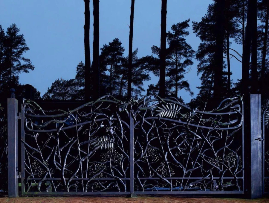 Private residence. Gates, decorative wall.