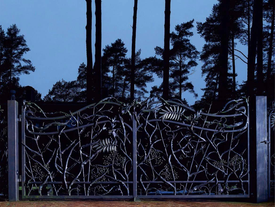 Private residence. Gates, decorative wall.