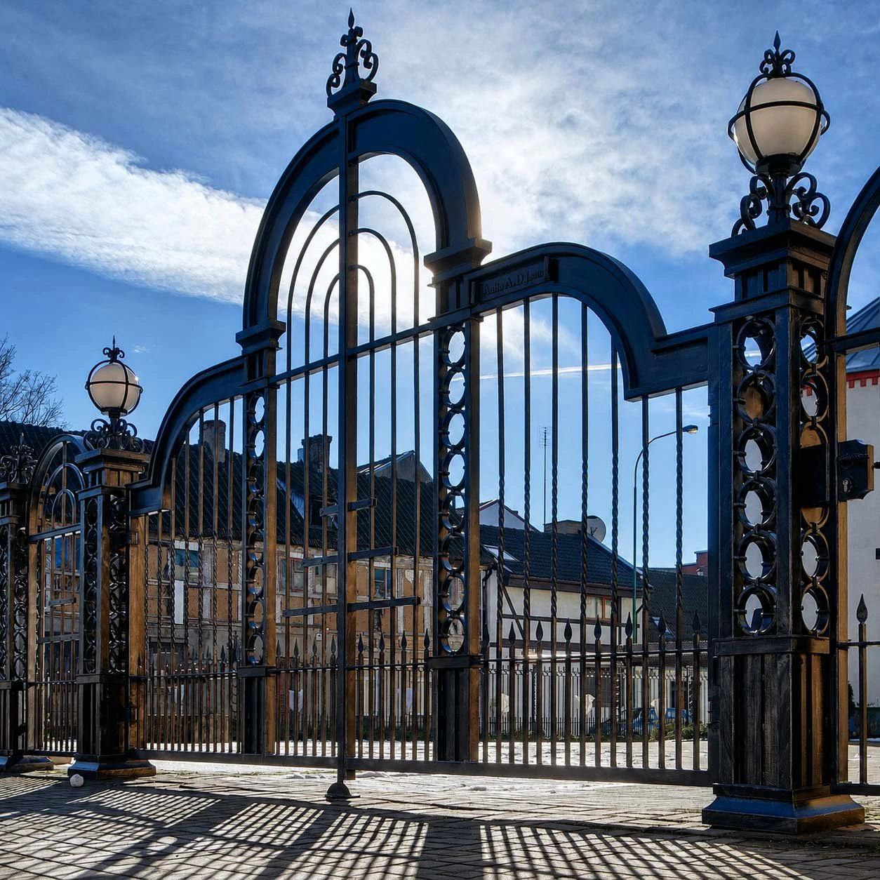 Church. Gates with portals, fence, columns and lights.
