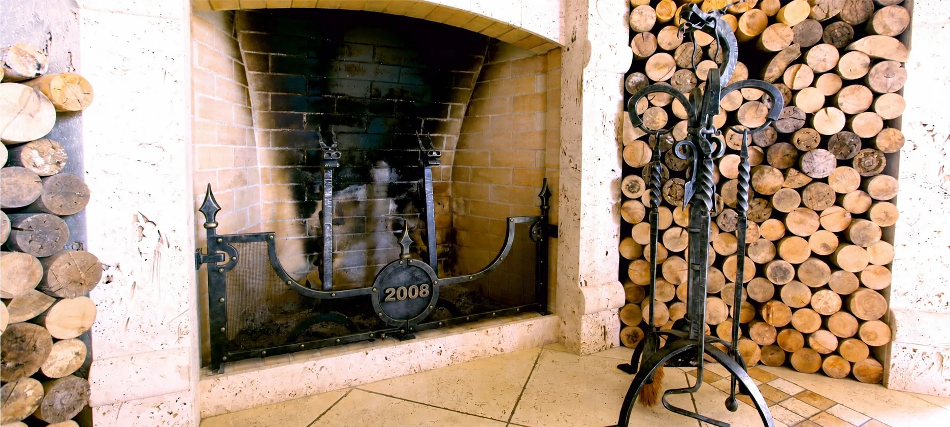 Bespoke metal fireplace in a castle hall interior